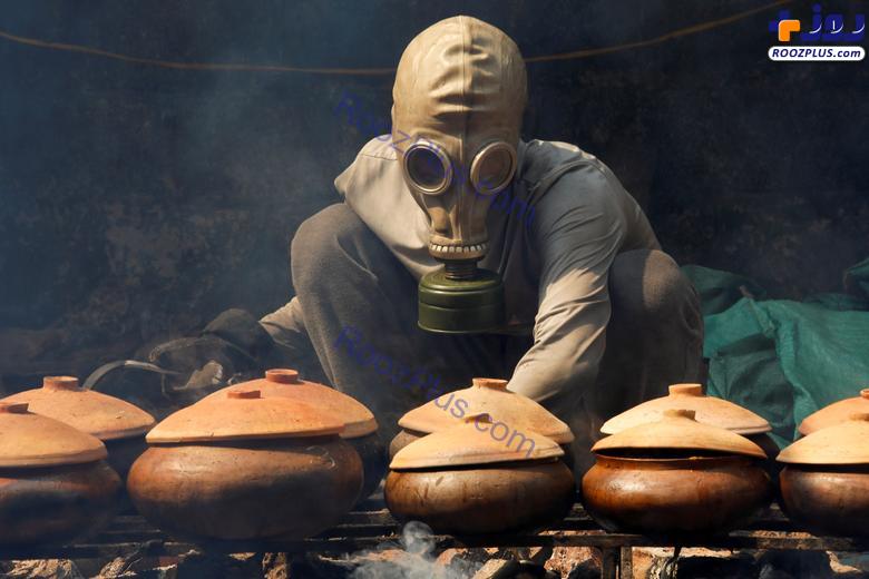 ماسک زدن عجیب در فرایند تهیه غذای سنتیِ ویتنام! +عکس