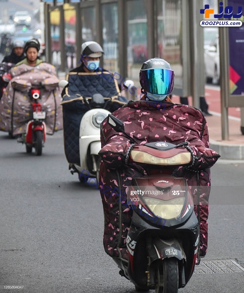 پوشش جالب موتورسواران چینی در هوای سرد +عکس