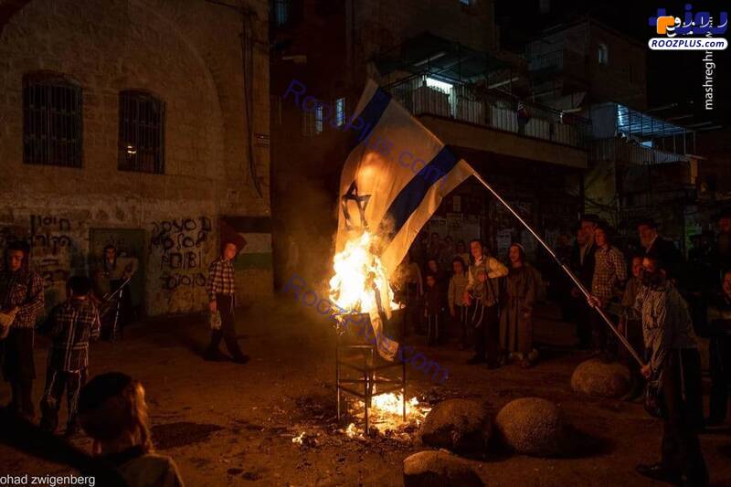 آتش زدن پرچم رژیم صهیونیستی توسط یهودیان+عکس