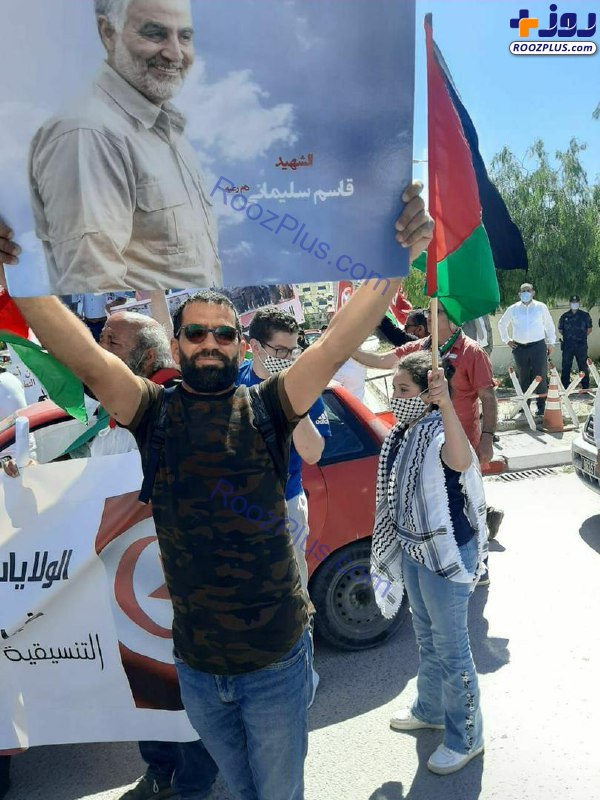 تصویر سردار سلیمانی در دست مخالفان عادی سازی با رژیم صهیونیستی در تونس +عکس